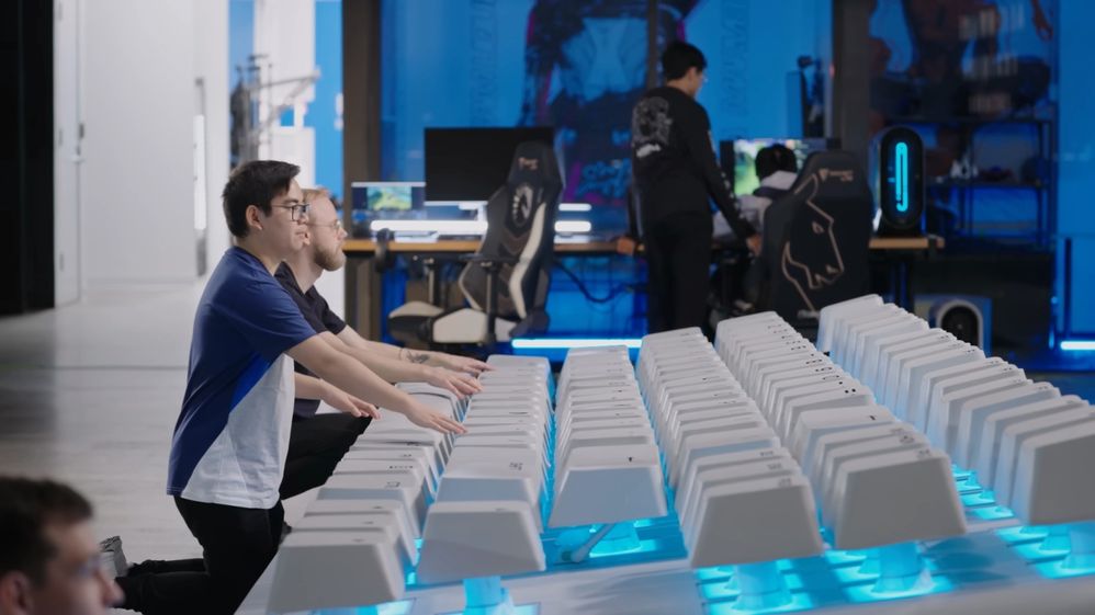 Team Liquid playing DOTA on a five-meter-long mechanical keyboard.
