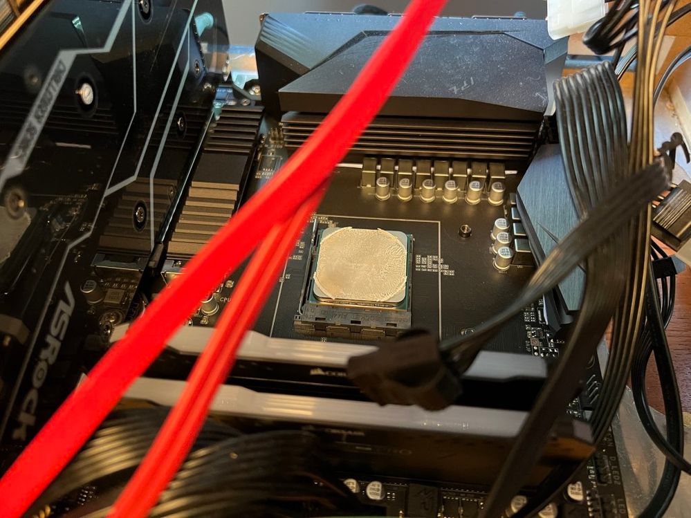 Here is the AMD Ryzen 5 5600X CPU, showing again the good thermal paste coverage.