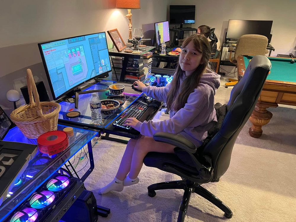 Granddaughter Ora playing another strange game on my 'Through the Looking Glass' build - which now has an RX 7900 XTX.