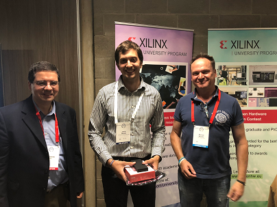 Hugo Andrade (XUP) and Michael Manske (FPL 2018 co-chair), Presenting One of the Winners with Their Prize of a PYNQ-Z2 Zynq Development Board