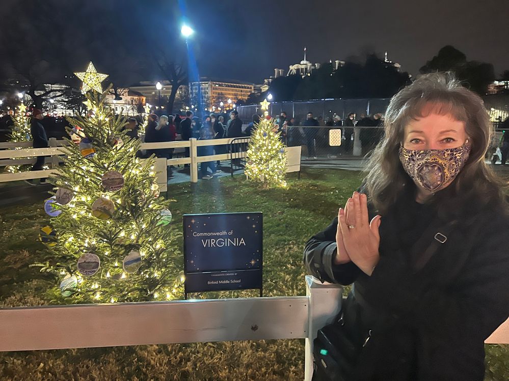 Sandra in front of the Virginia tree in 2021.