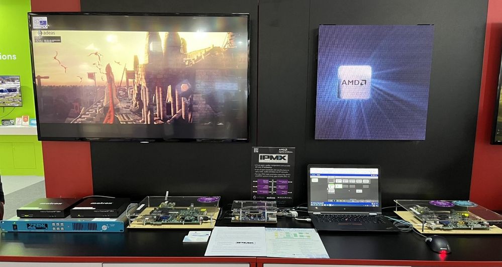 Figure 1: AMD IPMX demo at ISE 2023. Controlled by Matrox ConductIP, IPMX senders from Matrox, Village Island, and Adeas/Nextera Video connect to receivers from Adeas/Nextera Video to drive an HDMI monitor, and Megapixel VR to drive an ROE LED wall tile.