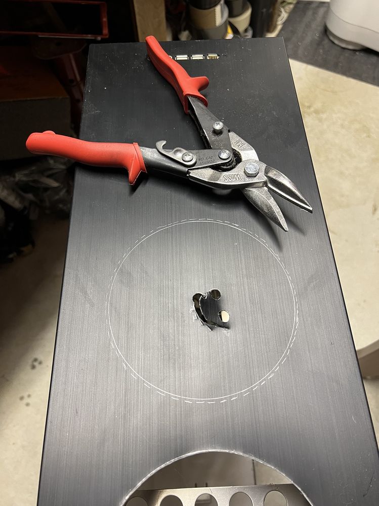 I drilled a few holes and then got to work with the airplane snips.