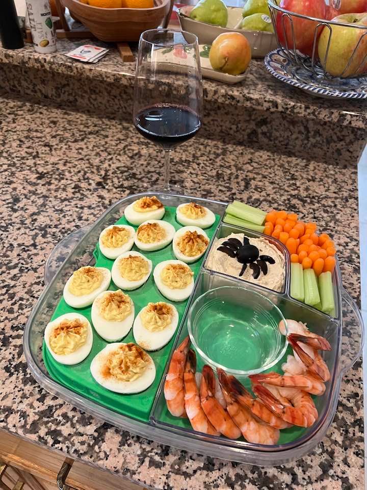 My wife Sandra made the appetizer dish - check out the black olives spider!