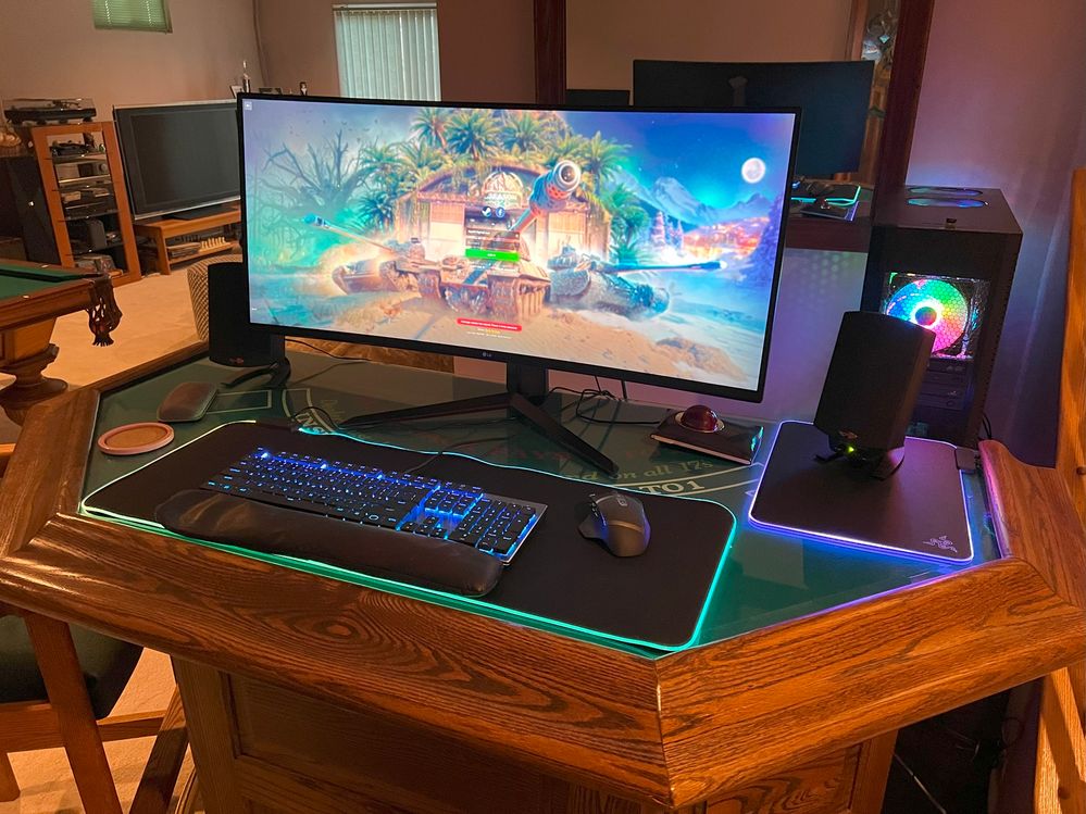 I moved my Razor RGB mousepad to the side to make room for the new RGB mousepad under the keyboard.  It is a decent surface for my wireless mouse.  I have a trackball mouse ready to use, but I now prefer the normal mouse for World of Tanks - Blitz.