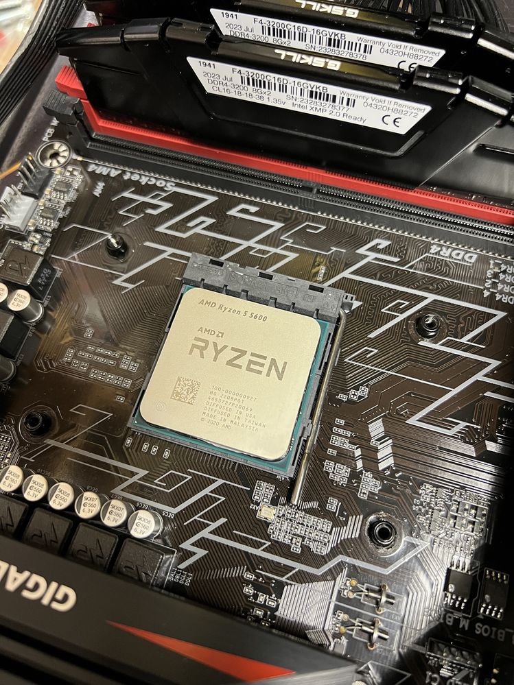 The Ryzen 5 5600 looks nice and comfy in the AM-4 socket.